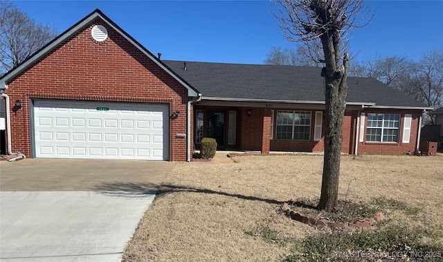 ranch-style house with a garage, brick siding, driveway, and a shingled roof