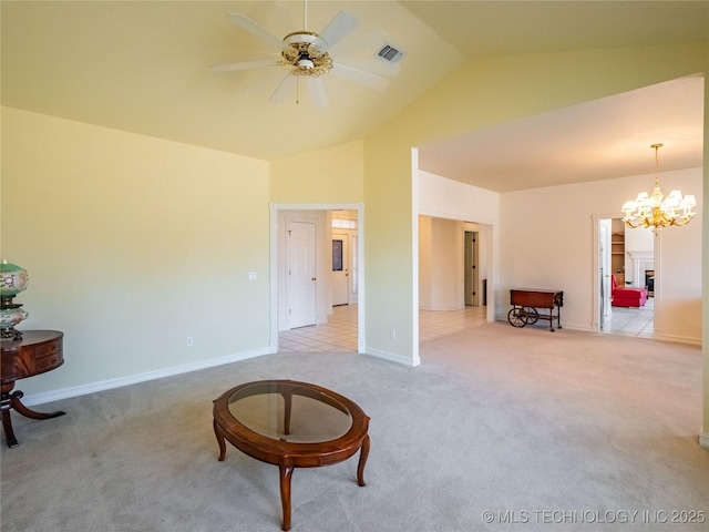 sitting room with visible vents, baseboards, light colored carpet, ceiling fan with notable chandelier, and high vaulted ceiling