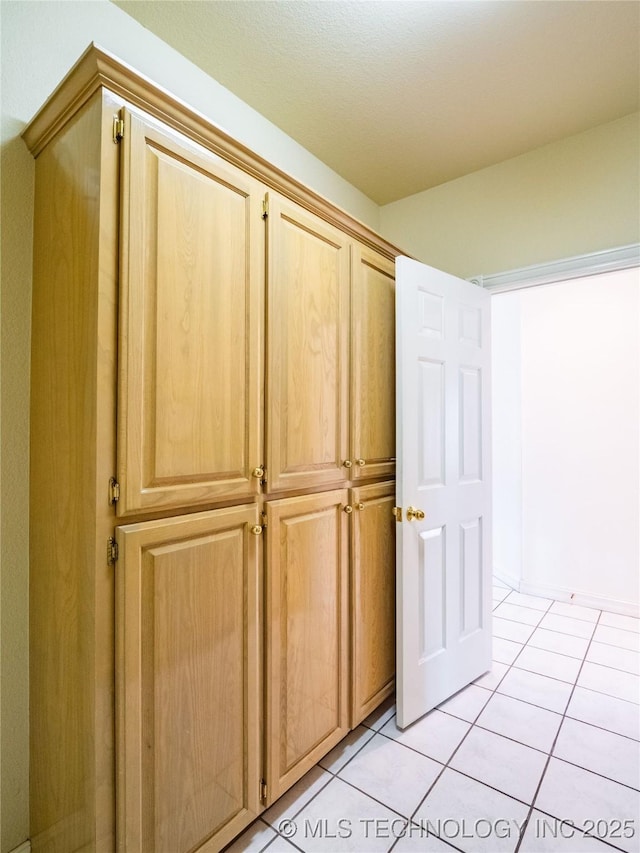 interior space featuring light tile patterned floors