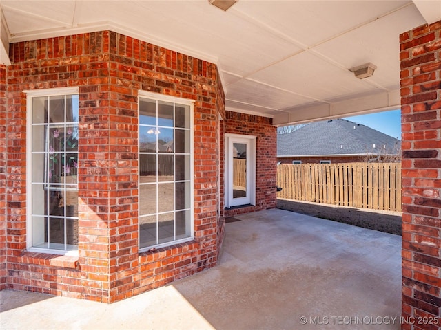 view of patio with fence