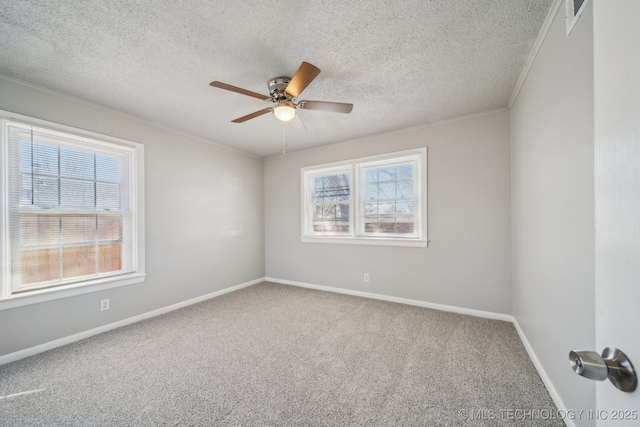8930 E Marshall St, Tulsa, OK 74115 - carpeted empty room with visible vents, baseboards, ornamental molding, a textured ceiling, and a ceiling fan
