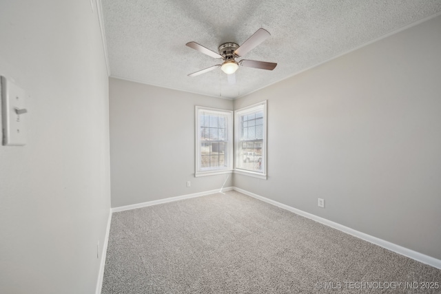 8930 E Marshall St, Tulsa, OK 74115 - empty room featuring baseboards, ornamental molding, carpet flooring, a textured ceiling, and a ceiling fan
