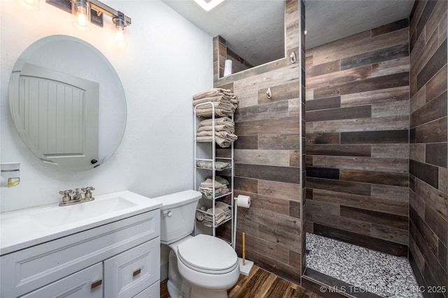 1522 Burney Cemetary, Calera, OK 74730 - full bathroom with wood finished floors, toilet, a walk in shower, and vanity
