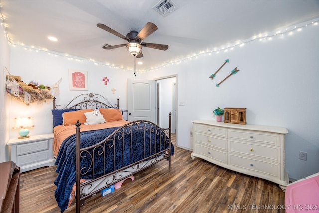 1522 Burney Cemetary, Calera, OK 74730 - bedroom featuring visible vents, a ceiling fan, and wood finished floors