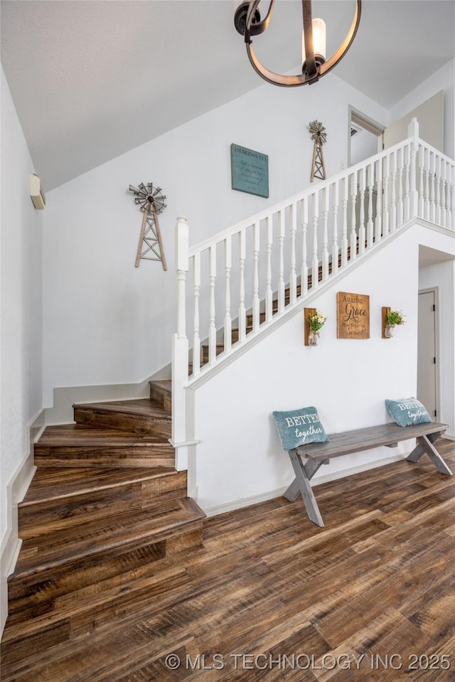 1522 Burney Cemetary, Calera, OK 74730 - staircase featuring high vaulted ceiling, a chandelier, and wood finished floors