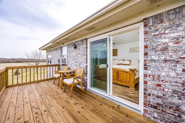 1522 Burney Cemetary, Calera, OK 74730 - wooden terrace featuring cooling unit