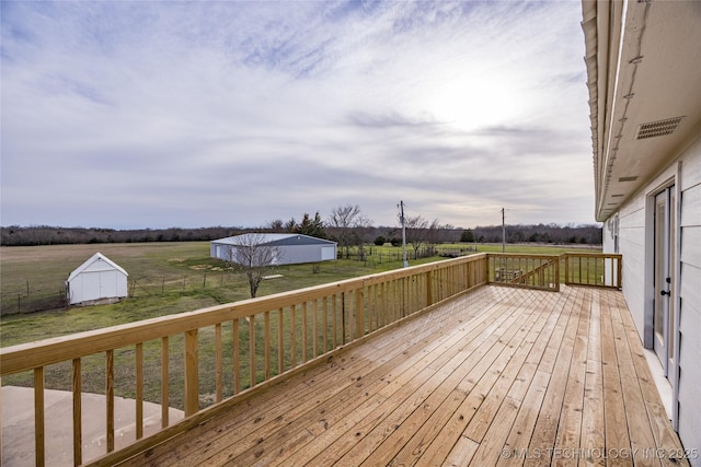 1522 Burney Cemetary, Calera, OK 74730 - deck featuring an outbuilding, a rural view, and a yard