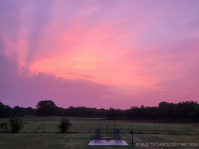 1522 Burney Cemetary, Calera, OK 74730 - yard at dusk with fence