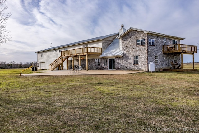 1522 Burney Cemetary, Calera, OK 74730 - rear view of property with a chimney, stairs, a deck, a yard, and a patio area