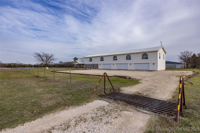 1522 Burney Cemetary, Calera, OK 74730 - exterior space with driveway, metal roof, and a yard