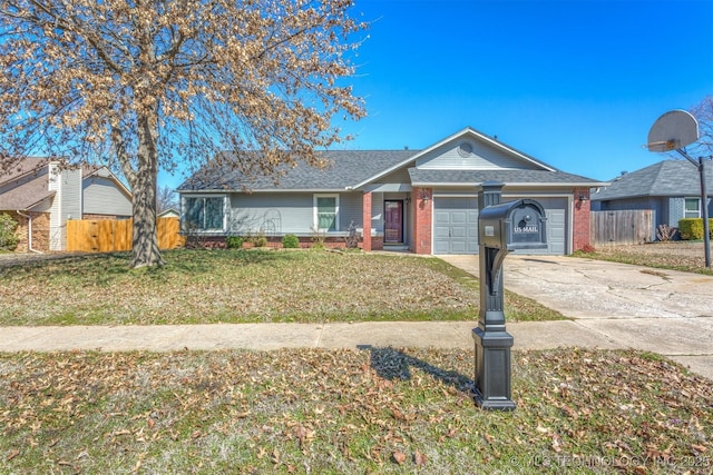 ranch-style house featuring brick siding, fence, concrete driveway, a front yard, and an attached garage