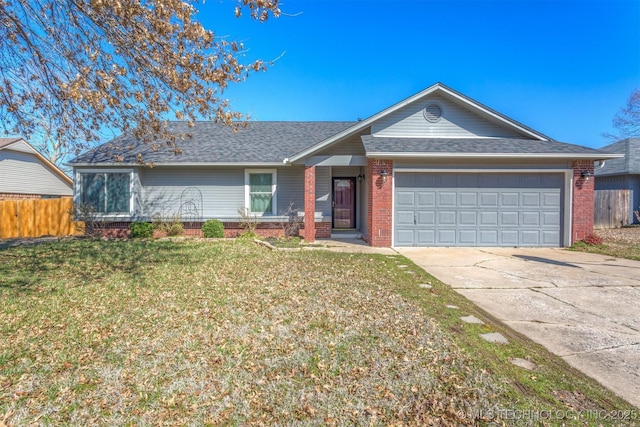 ranch-style house featuring brick siding, a front yard, fence, and a garage