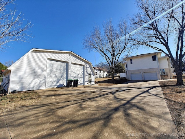 view of property exterior featuring a garage