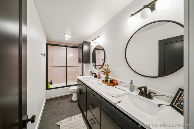 7701 S 21st St, Broken Arrow, OK 74011 - full bath with shower / washtub combination, a sink, toilet, double vanity, and tile patterned floors