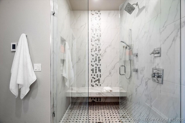 full bath with a marble finish shower