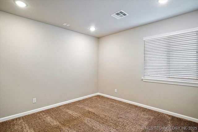 empty room featuring recessed lighting, visible vents, baseboards, and carpet flooring