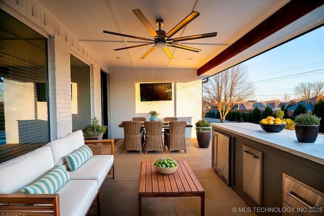 view of patio / terrace with outdoor lounge area, outdoor dining area, and a ceiling fan