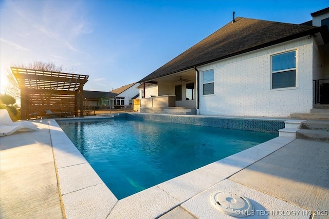 pool featuring a patio and a ceiling fan