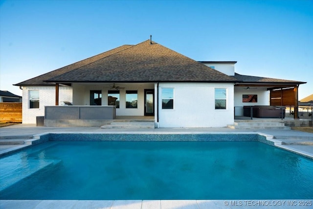 outdoor pool featuring a patio area, outdoor dry bar, ceiling fan, and fence