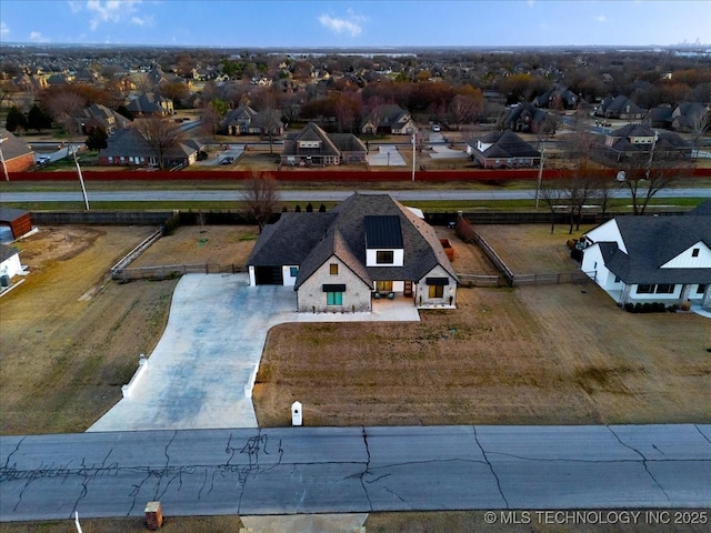 drone / aerial view featuring a residential view