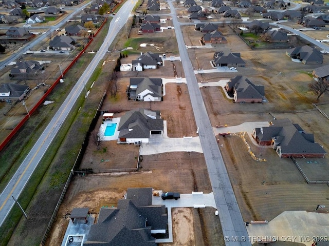 drone / aerial view with a residential view