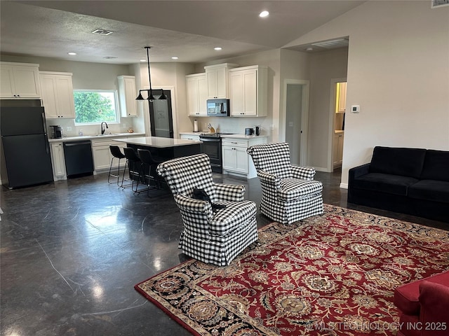 living room featuring recessed lighting, visible vents, lofted ceiling, and a textured ceiling