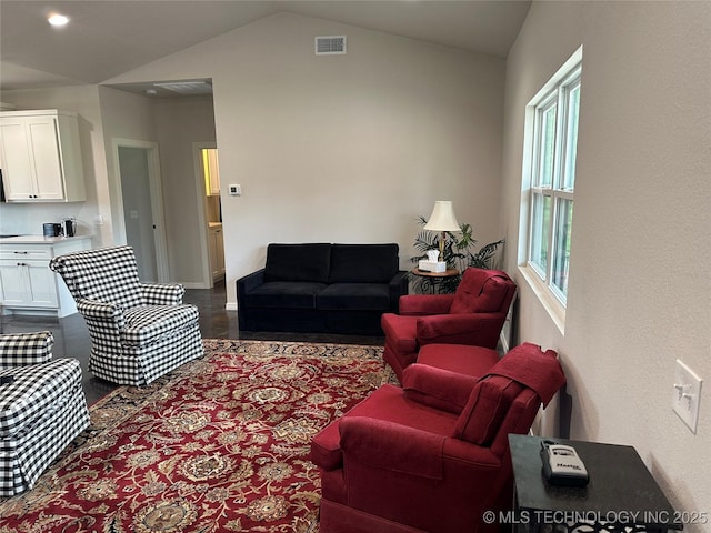 living room featuring visible vents, dark wood-style floors, recessed lighting, baseboards, and vaulted ceiling