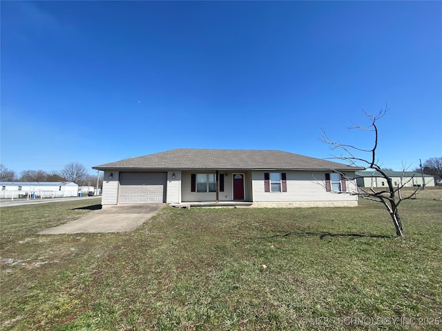 view of front of home featuring driveway, an attached garage, a front yard, and roof with shingles