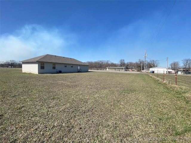 view of yard featuring fence