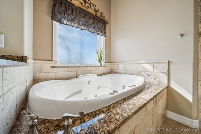 bathroom featuring a whirlpool tub