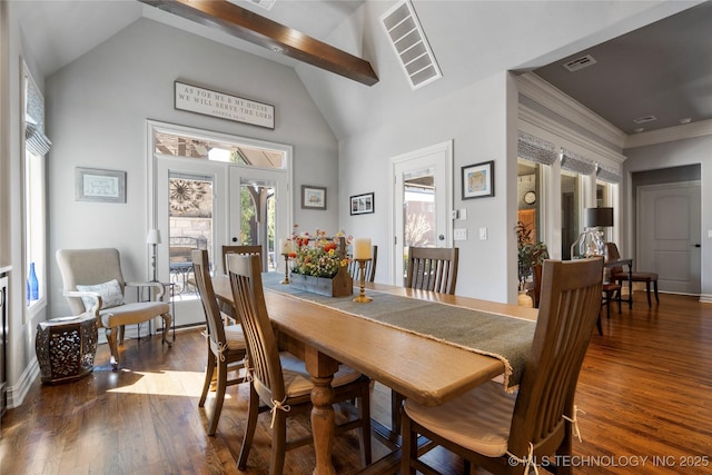 dining area with french doors, dark wood-type flooring, visible vents, and high vaulted ceiling