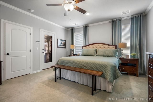 bedroom featuring light carpet, visible vents, crown molding, and a ceiling fan