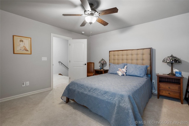 bedroom with baseboards, carpet floors, and ceiling fan