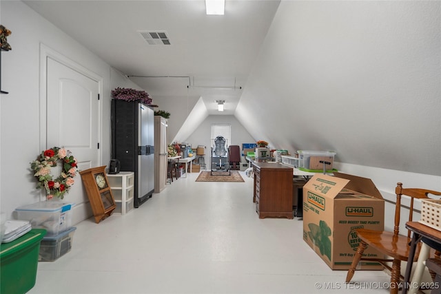 bonus room with lofted ceiling and visible vents