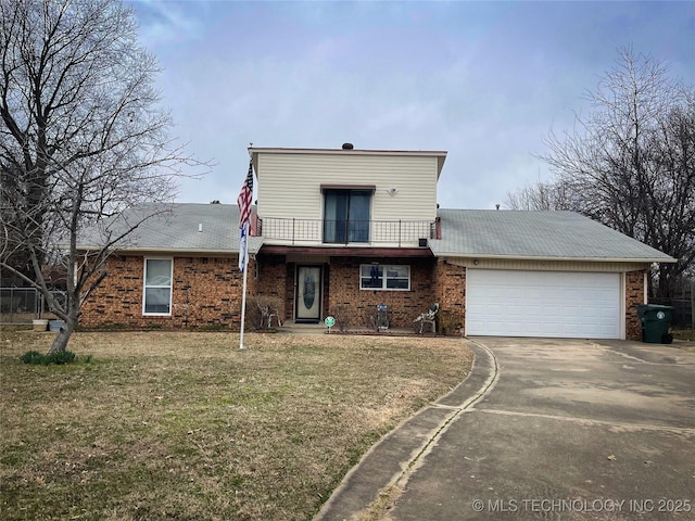 traditional home featuring a balcony, driveway, an attached garage, a front lawn, and brick siding