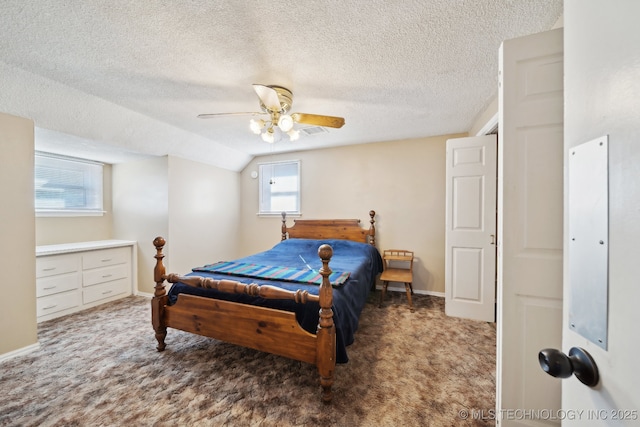 bedroom with baseboards, a textured ceiling, ceiling fan, and carpet flooring