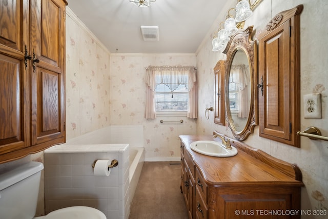 full bath featuring wallpapered walls, baseboards, toilet, a tub to relax in, and vanity