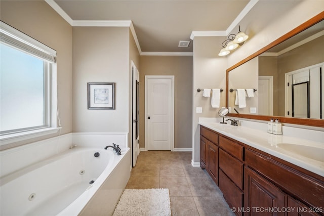 bathroom with crown molding, double vanity, tile patterned floors, a tub with jets, and a sink