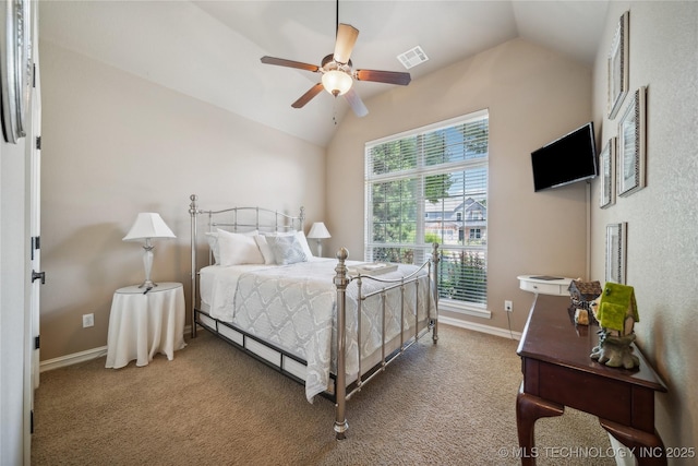 carpeted bedroom featuring visible vents, ceiling fan, baseboards, and lofted ceiling