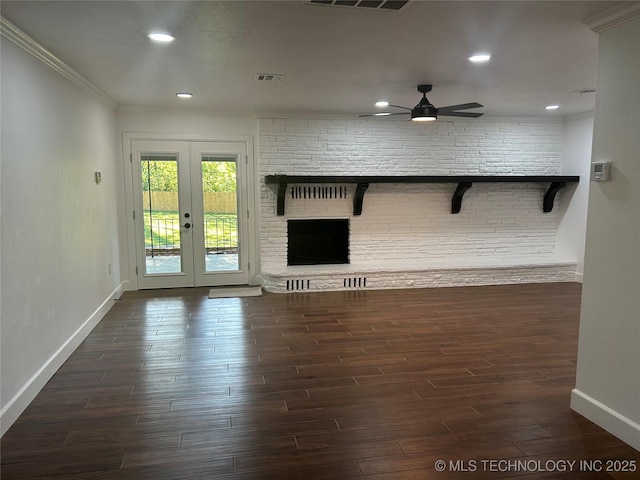 unfurnished living room with baseboards, ornamental molding, french doors, dark wood-style floors, and a ceiling fan