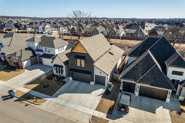 drone / aerial view with a residential view