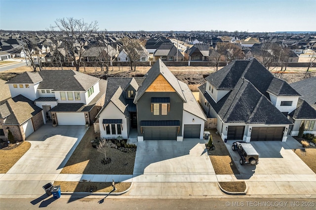 drone / aerial view featuring a residential view