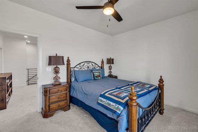 bedroom with carpet floors and a ceiling fan