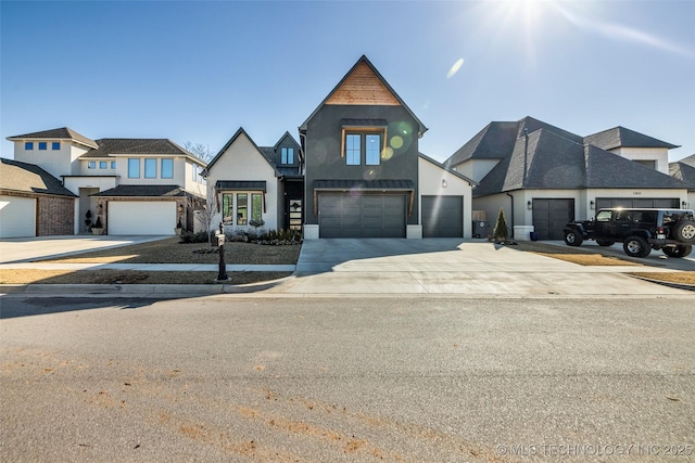 view of front of home featuring driveway and an attached garage