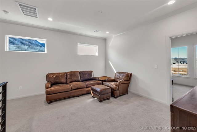 living area featuring recessed lighting, visible vents, carpet floors, and baseboards