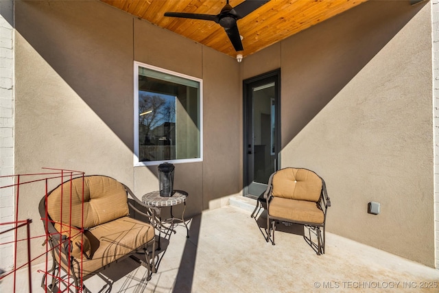 view of patio / terrace featuring ceiling fan