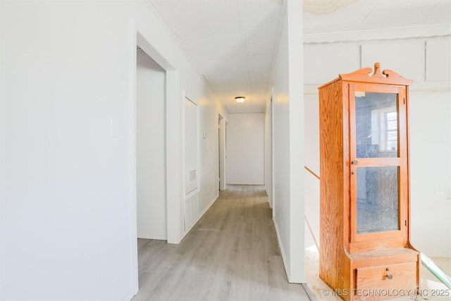 hallway with light wood finished floors