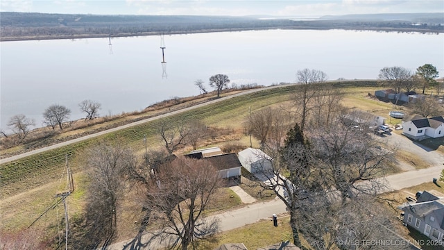 birds eye view of property featuring a rural view and a water view