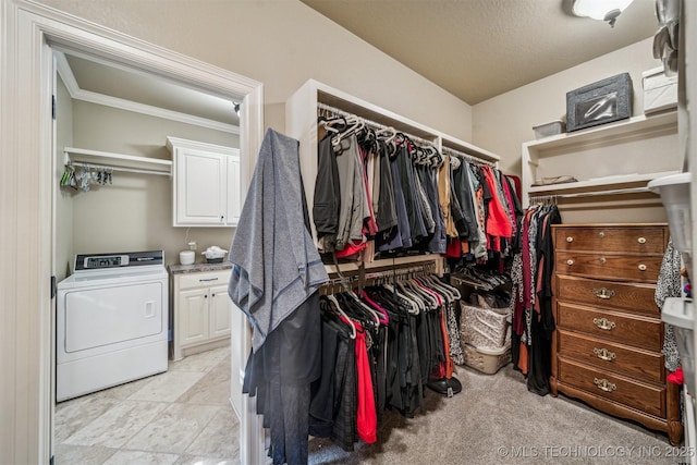 walk in closet featuring washer / clothes dryer