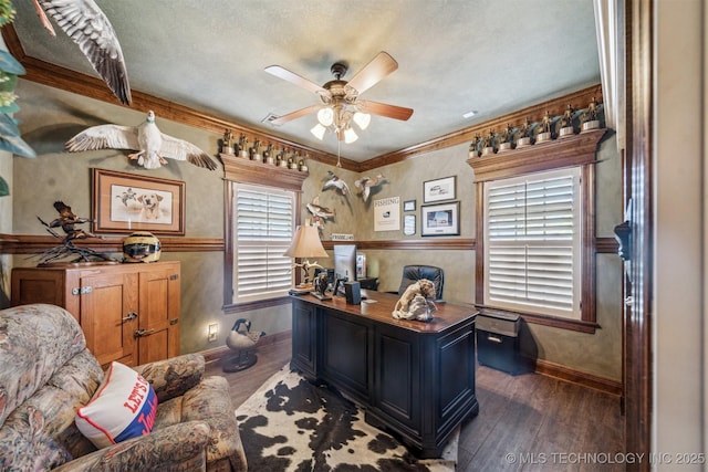 office space featuring ornamental molding, baseboards, ceiling fan, and wood finished floors